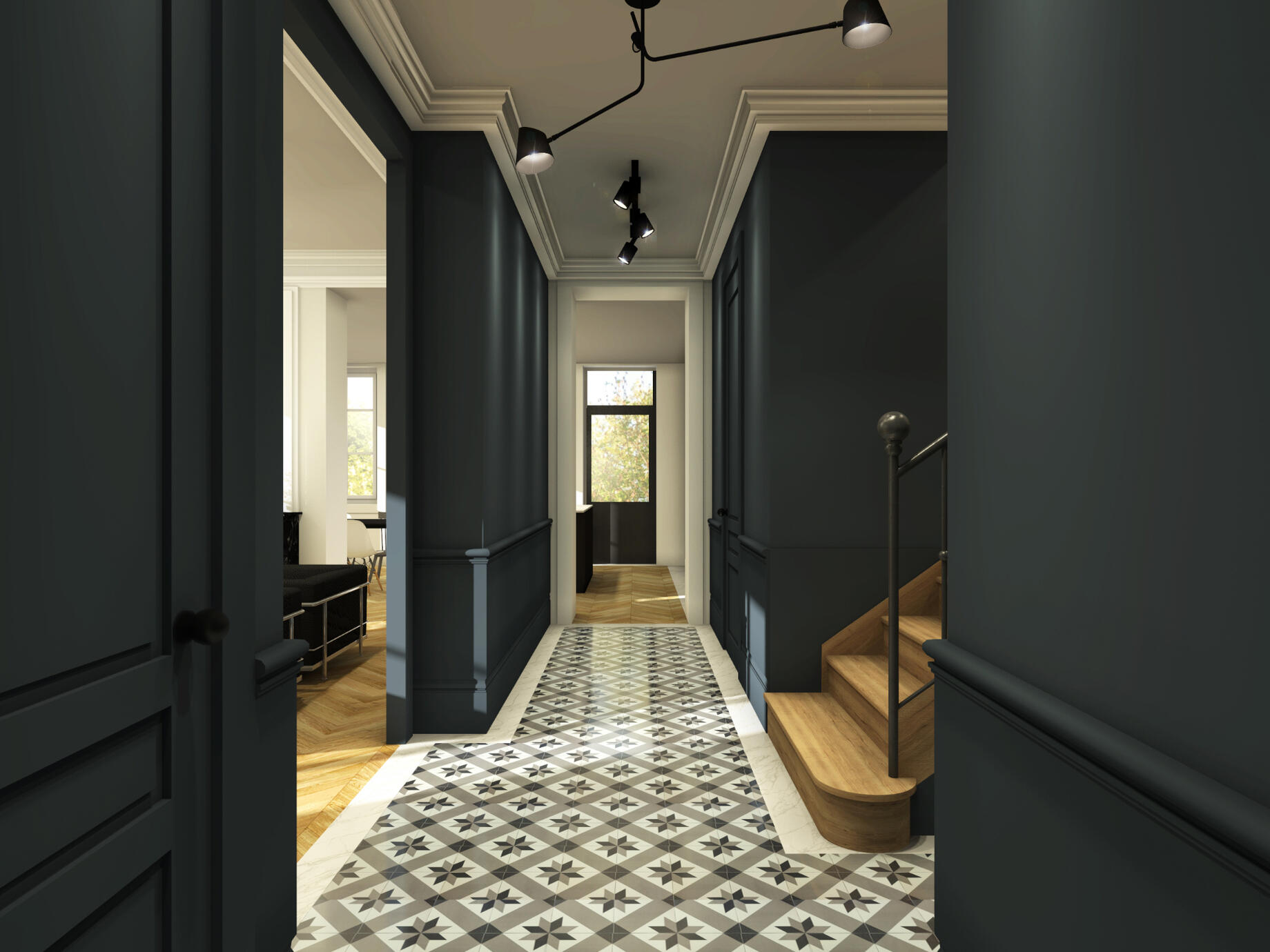 Les carreaux de ciment d’origine de l’entrée, les moulures sont conservés. Le couloir est peint en bleu pour venir souligner et mettre en valeur les moulures, ce qui vient apporter une note plus contemporaine à la bâtisse.